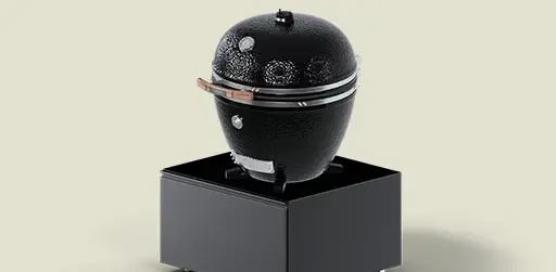 Keramikgrill im modernen Design auf schwarzem Untergestell für Outdoor-Grillen.